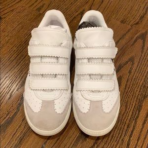 Isabel Marant white and gold leather sneakers